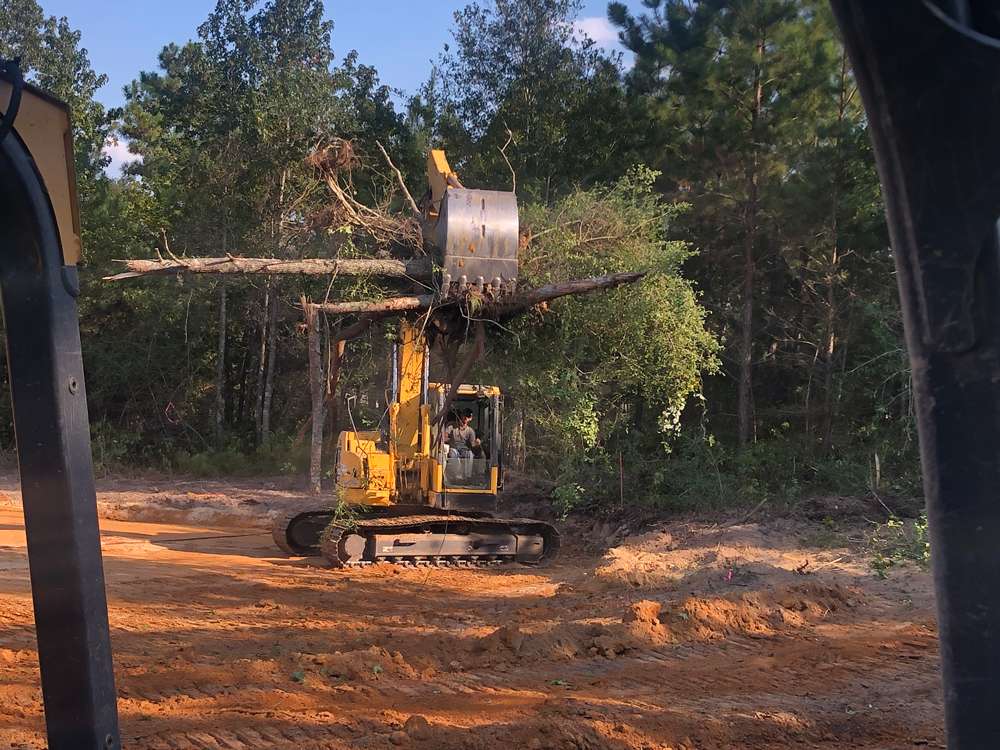 Residential land clearing preparing lot for construction