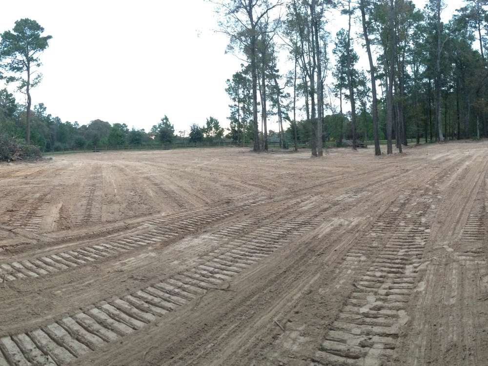 Pasture in the Houston area after land clearing, raked and bladed off to a smooth open surface ready for grass
